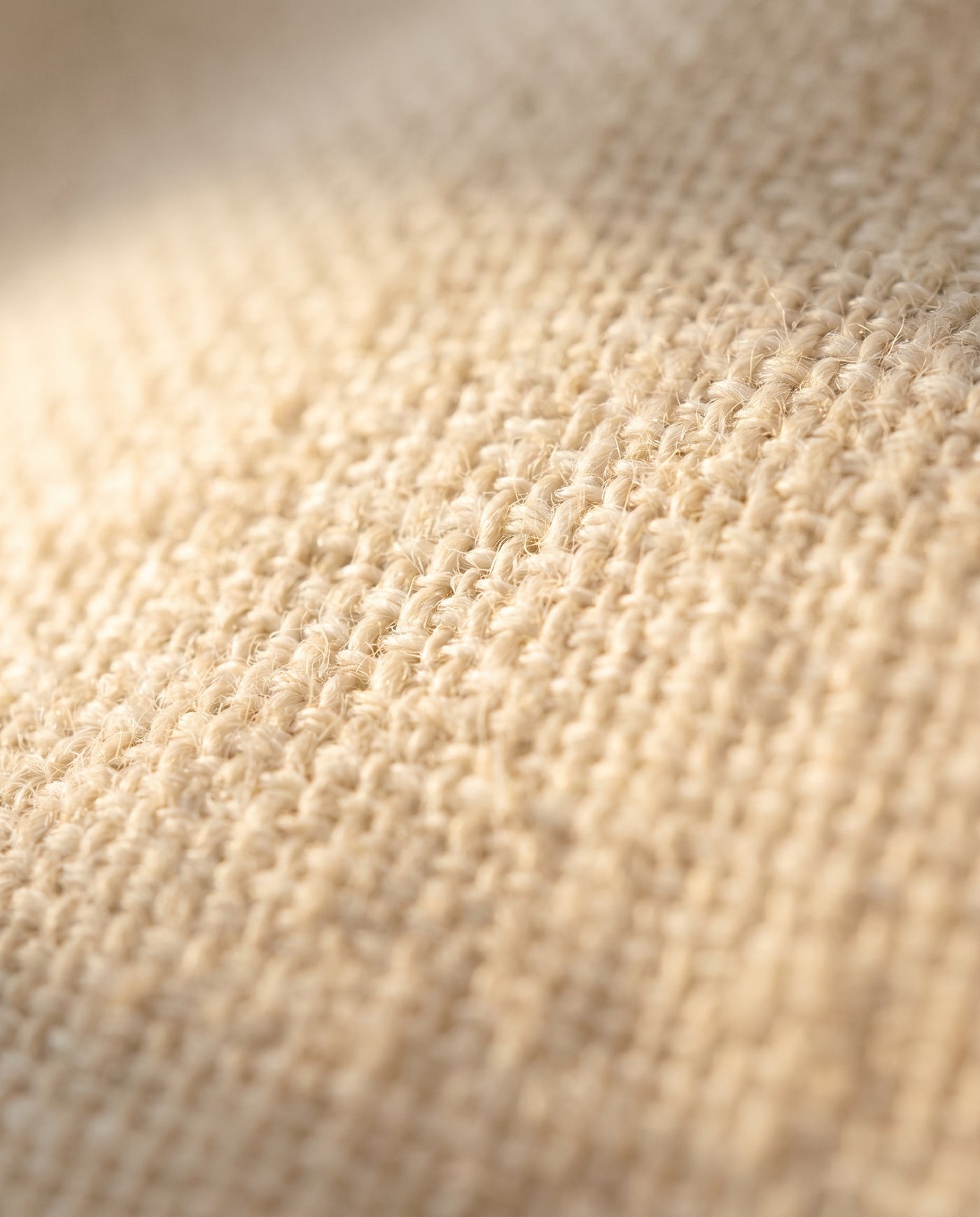 Macro, tissage de lin, lumière dorée